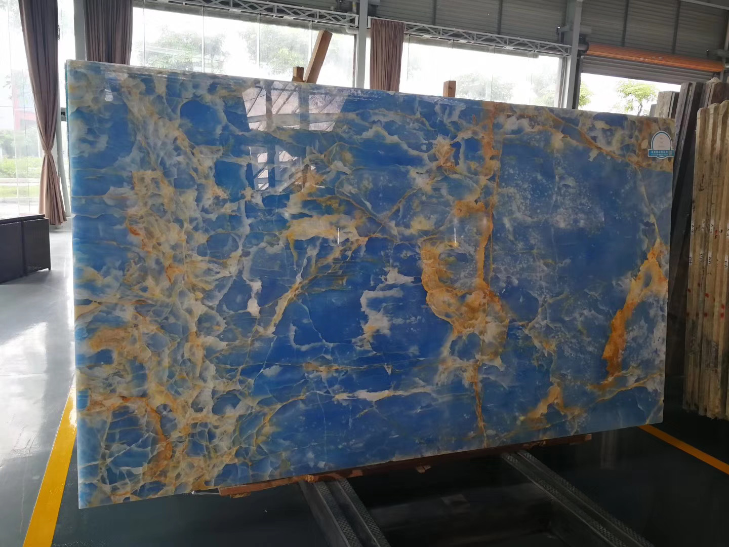 Backlit golden sky blue onyx marble slab wall cladding