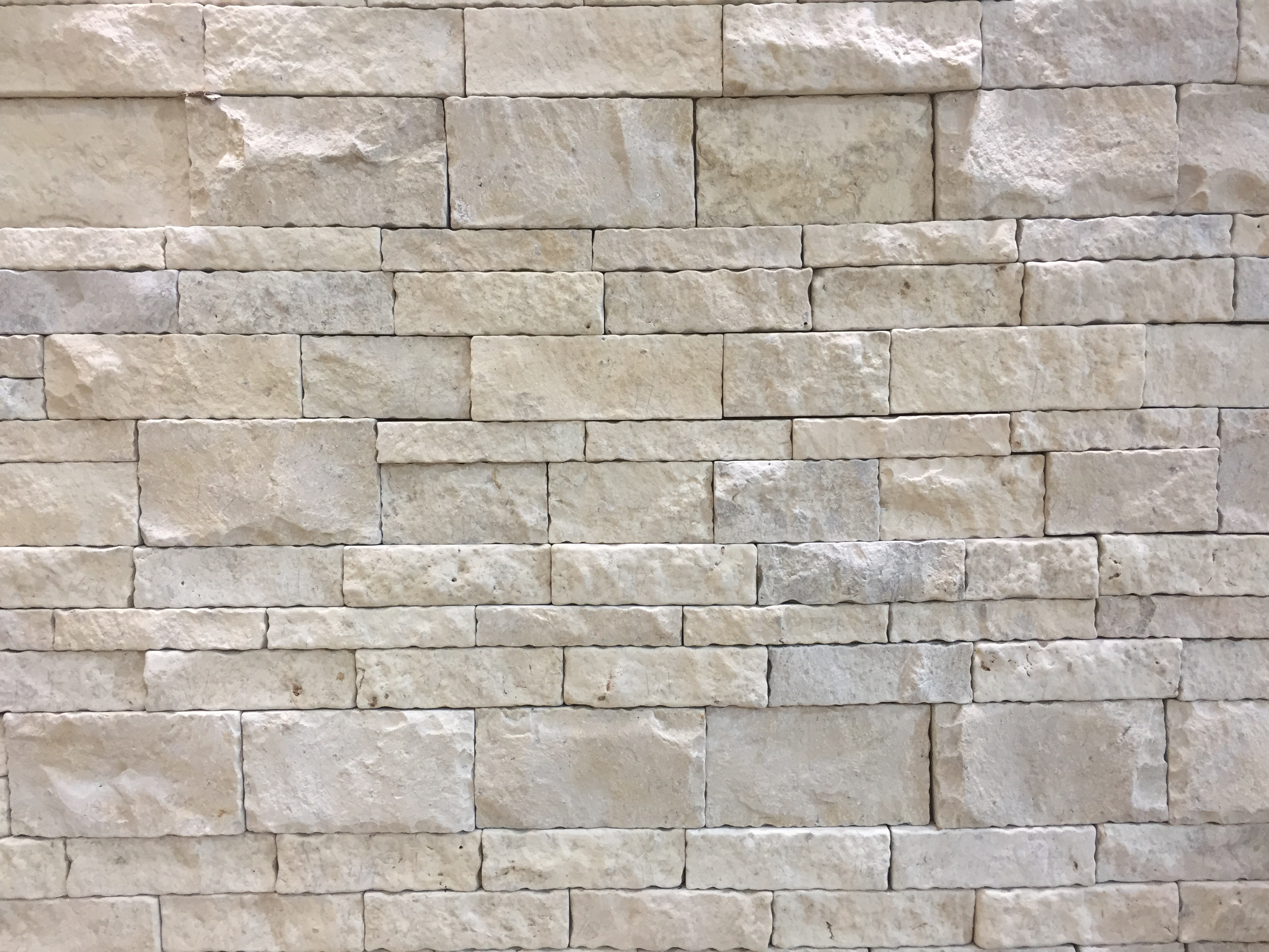 Wholesale high quality China beige faux limestone rock for chicken feed fireplace surround and wall floor tiles