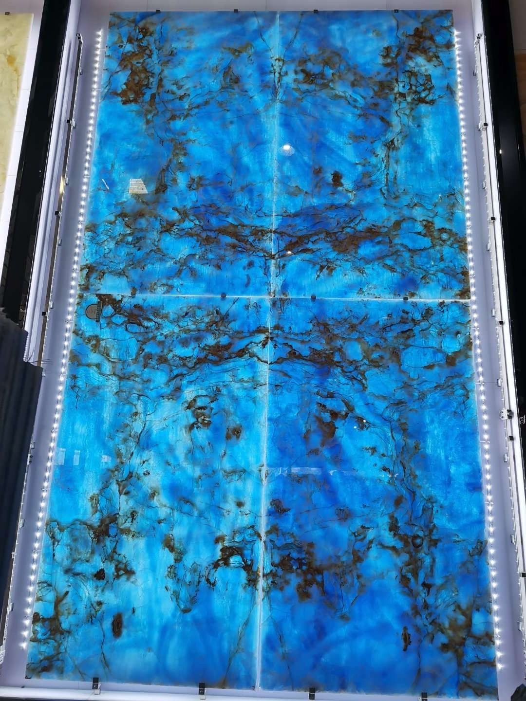 Backlit golden sky blue onyx marble slab wall cladding