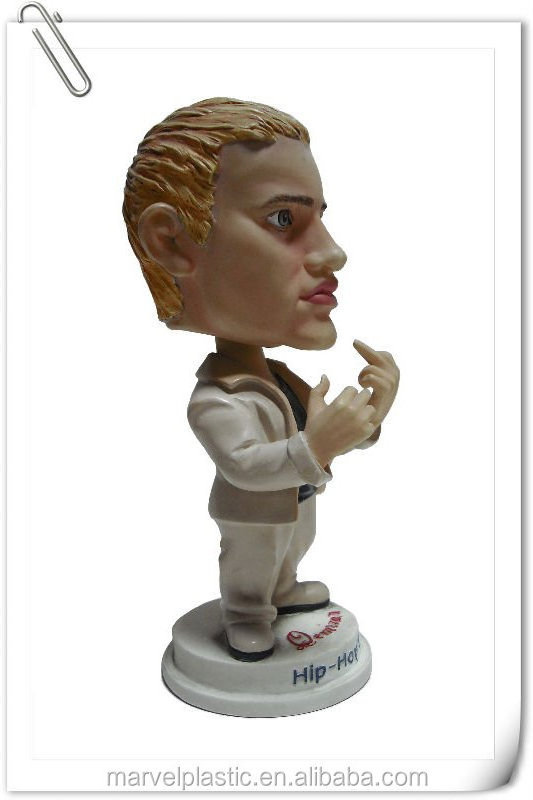 Human statue maker cartoon bobble head miniature toy