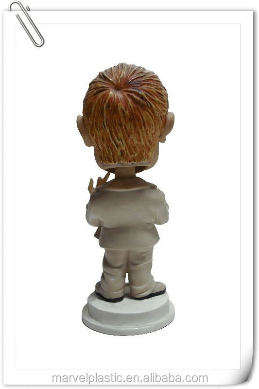 Human statue maker cartoon bobble head miniature toy