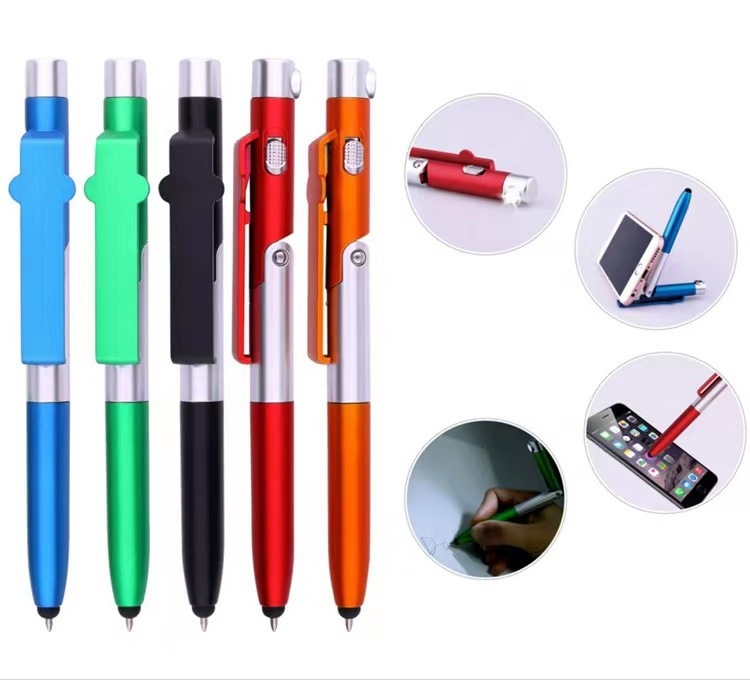 Hot Sale 4 in 1 multi-functional LED flashlight folding touch capacitive ballpoint pen with tablet cellphone stand holder