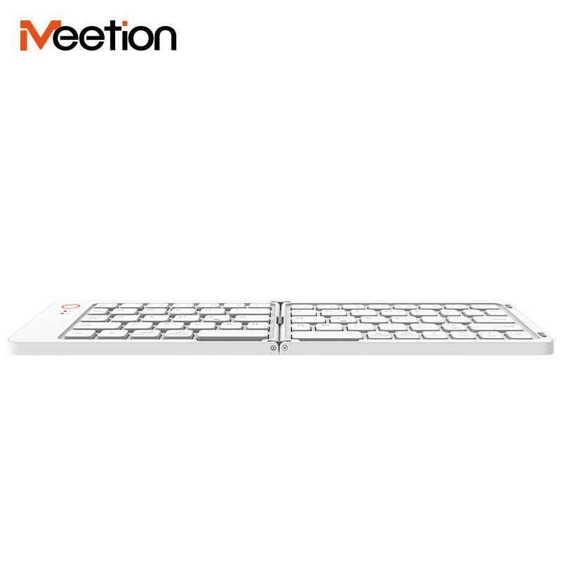 Meetion BTK001 waterproof folding keyboards lightweight magnetic induction portable foldable flexible keyboard for i pad