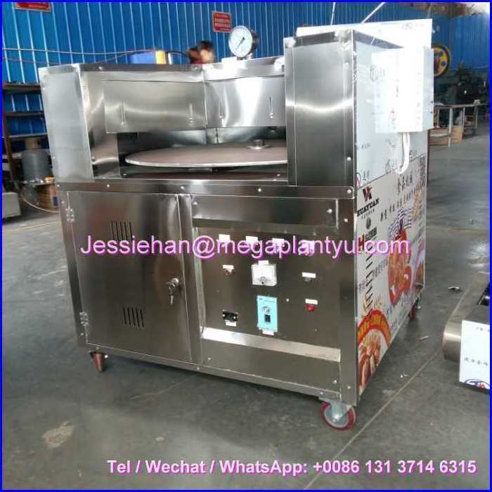 India restaurant use automatic roti maker tandoori oven to make roti naan chapati oven