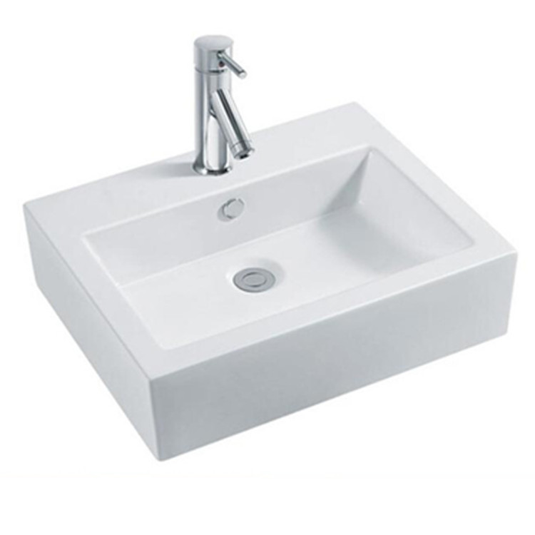 Ceramic sanitary ware above counter vessel sinks