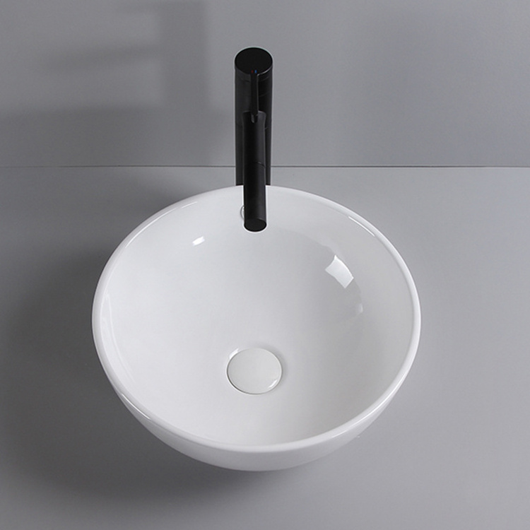 Porcelain hotsell round shaped bathroom sink wash basin