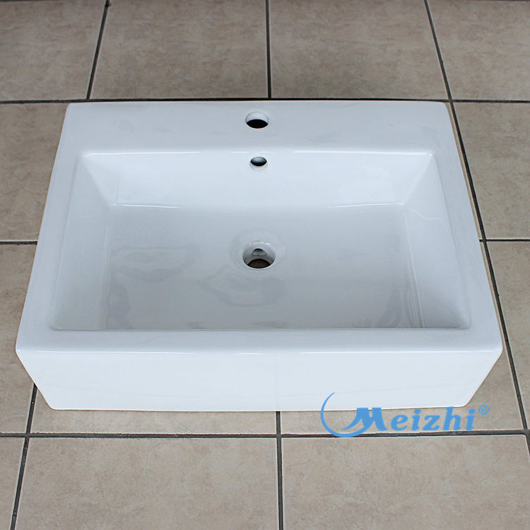 Ceramic sanitary ware above counter vessel sinks