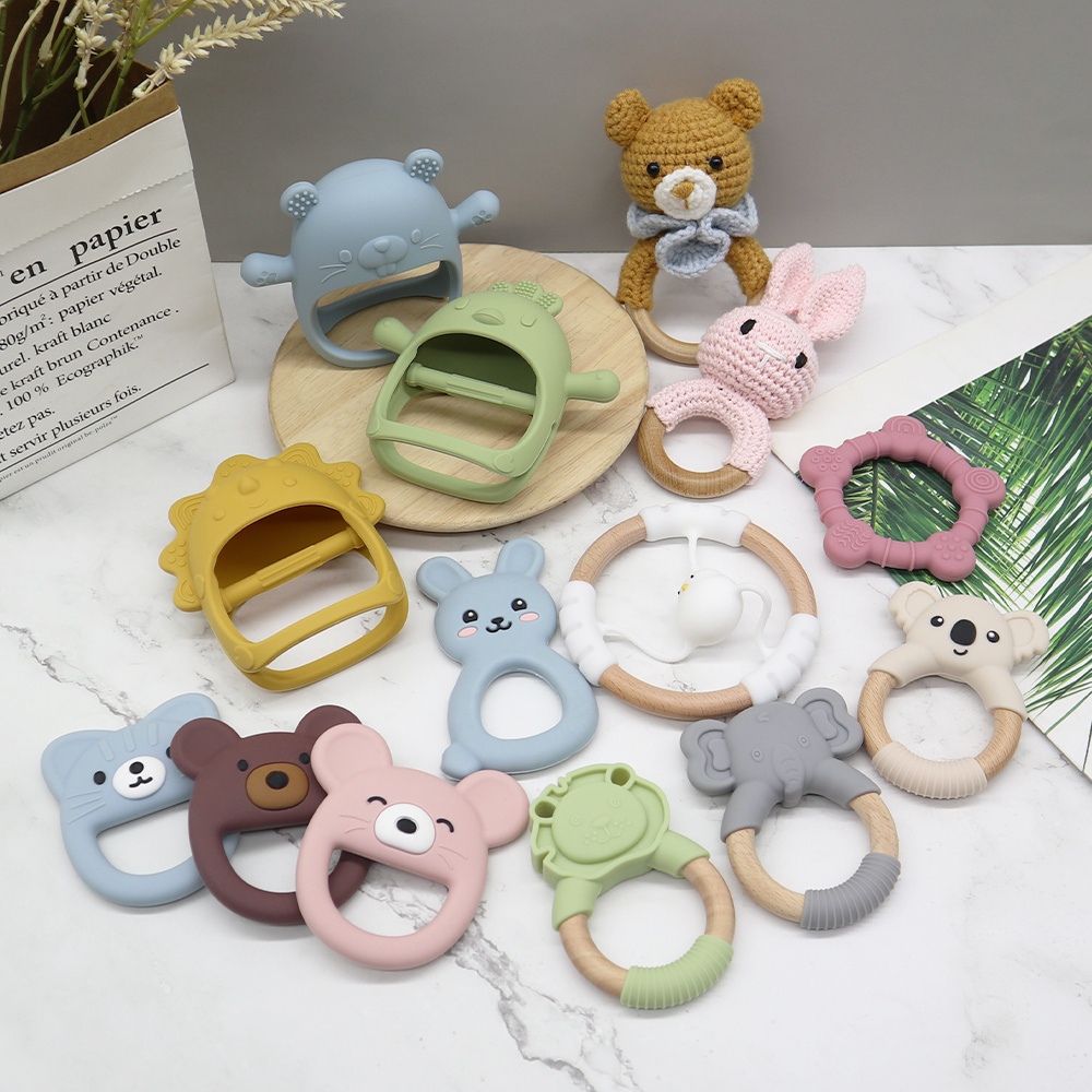 Factory Supplier Private Label New BPA Free Freezable Soft Newborn Teething Pacifier Rattle Toys Silicone Baby Teethers