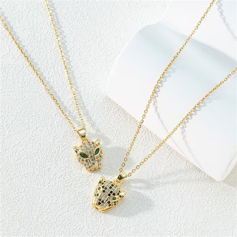 Dreamwork 18K Gold Plated Copper Cubic Zirconia Leopard Pendant Necklace with Titanium Chain 19.7