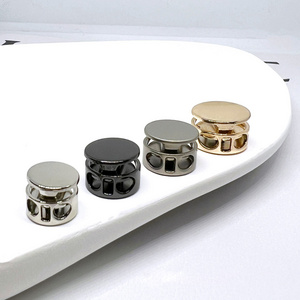 Good quality Zinc Alloy 2 Holels One Hole Glossy Gold Spring Metal Draw Cord Stopper Metal Cord Lock