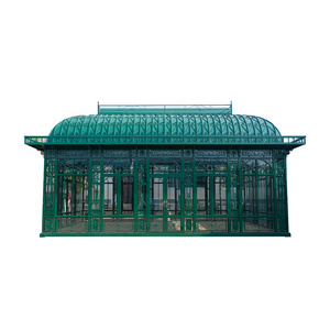 wrought iron round gazebo with glass and metal plate roof