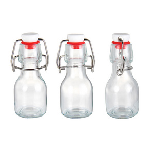 2oz 50ml 60ml Empty Mini Flip Top Bottle Clear Swing Top Glass Bottles for Juice Beverage with Cap