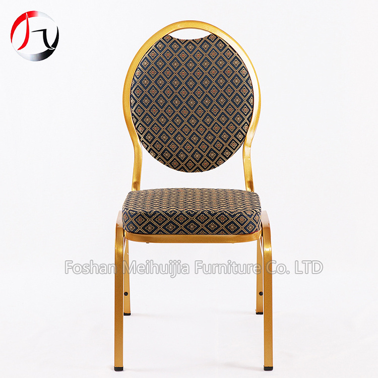 hercules teardrop back stacking banquet chair in gold frame