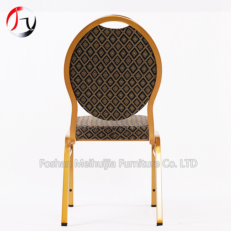 hercules teardrop back stacking banquet chair in gold frame