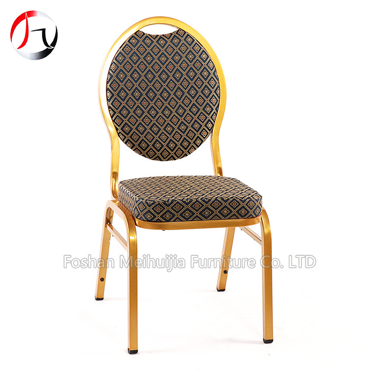 hercules teardrop back stacking banquet chair in gold frame