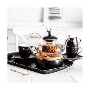 Modern black gift box luxury porcelain cup saucer heating base sets ceramic tea set with glass teapot