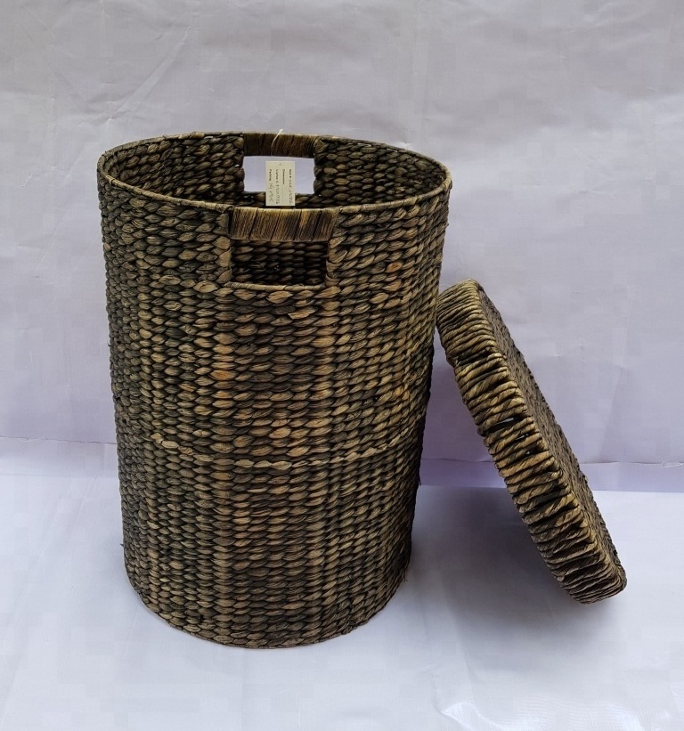 Tall natural high quality water hyacinth basket for laundry storage in black with lid and handles made in Vietnam