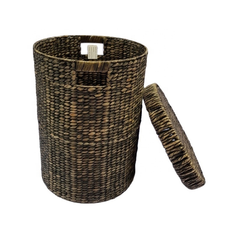 Tall natural high quality water hyacinth basket for laundry storage in black with lid and handles made in Vietnam