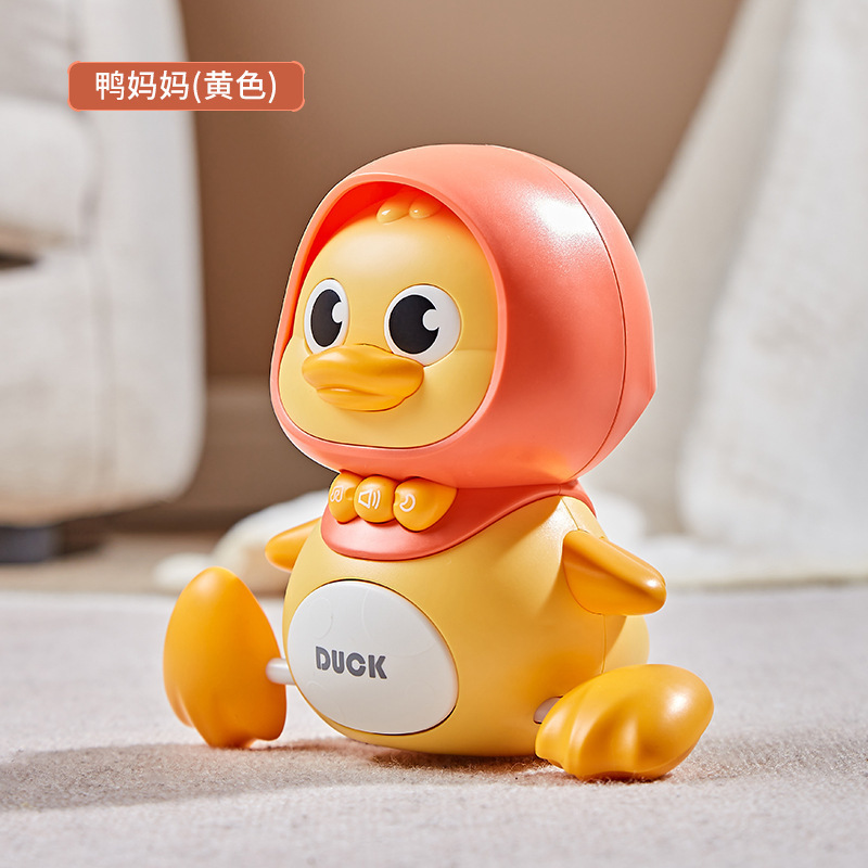 Electric swinging duckling walking magnetic toy, children's sound and light climbing toy duck