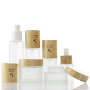 30ml Luxury Frosted Round Cosmetic Glass Liquid Foundation foundation primer Spray Pump Bottle With Bamboo Lotion Pump