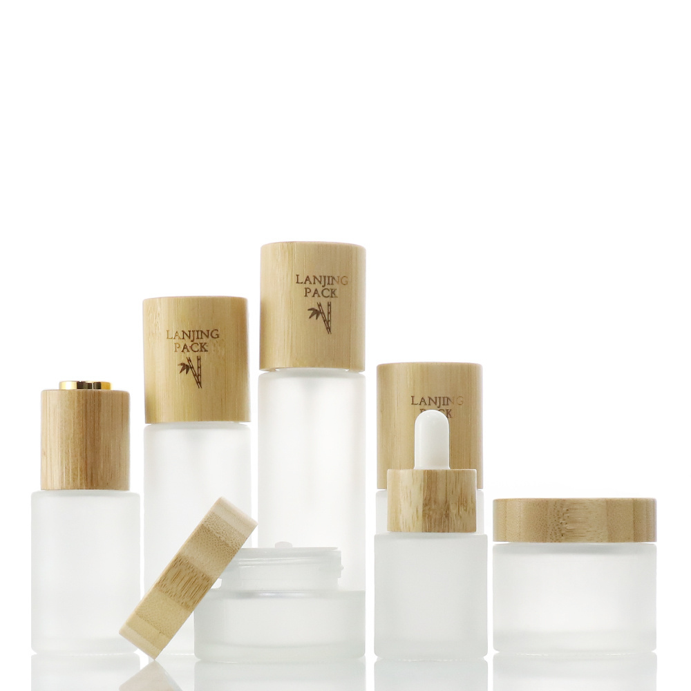 30ml Luxury Frosted Round Cosmetic Glass Liquid Foundation foundation primer Spray Pump Bottle With Bamboo Lotion Pump