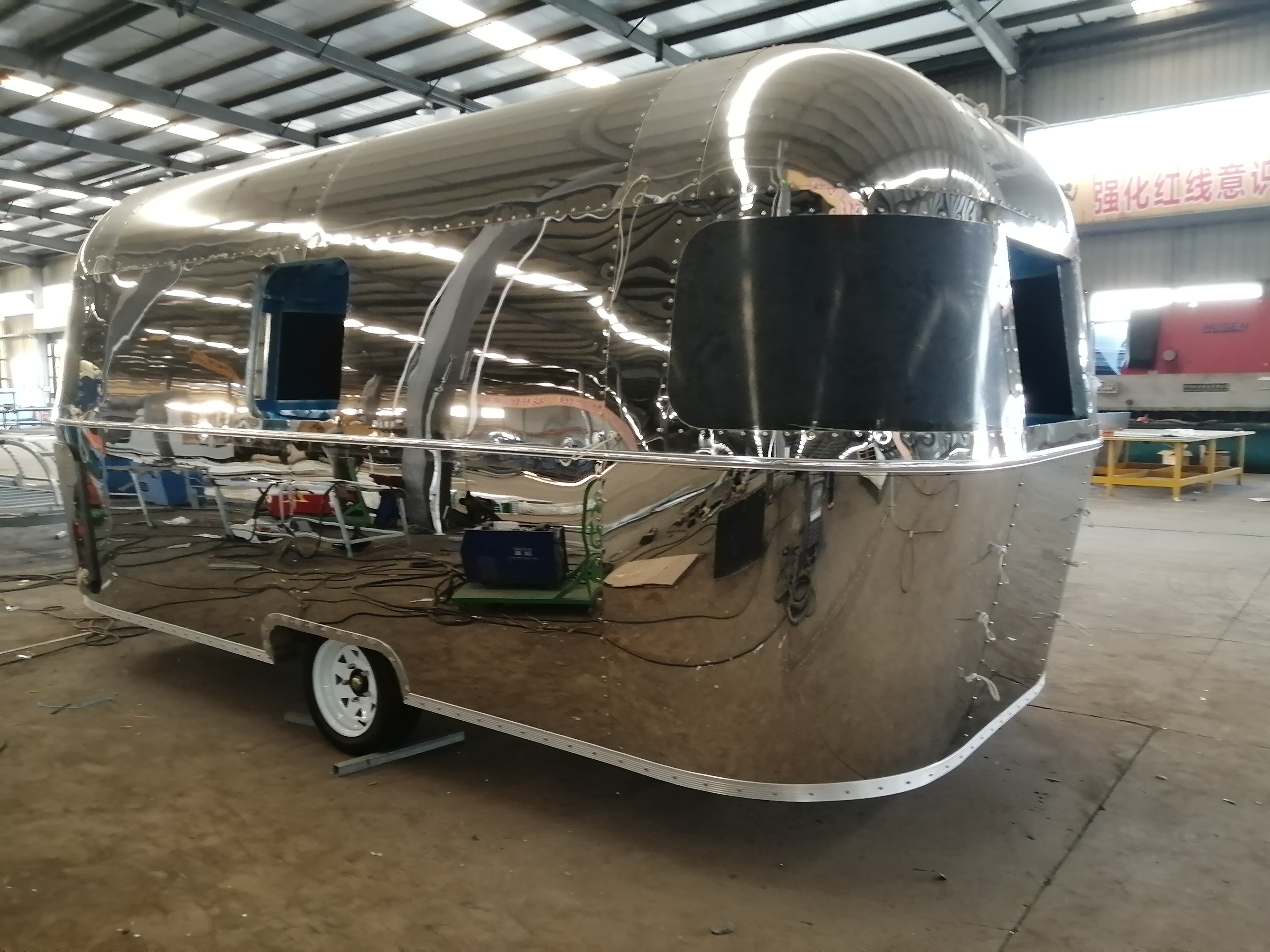 Mirror stainless steel classic popular airstream travel truck, retro-styled wedding RV trailer