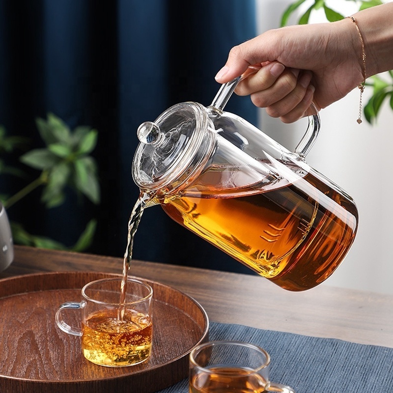 Custom Hand Blown Heat Resistant Clear Glass Tea Pot Fruit Tea Water Jug Glass Carafe Borosilicate Glass Teapot With Infuser