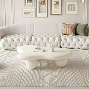 Light luxury white cream-style coffee table simple irregular shape coffee table with ball base