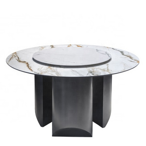 White round marble dining table with rotating centre