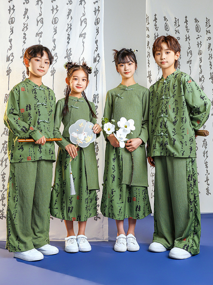 Children's cheerleaders perform the Chinese style class costume set for opening ceremony of Primary school Games