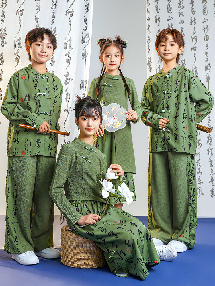 Children's cheerleaders perform the Chinese style class costume set for opening ceremony of Primary school Games