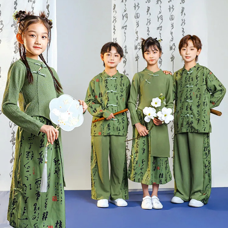 Children's cheerleaders perform the Chinese style class costume set for opening ceremony of Primary school Games