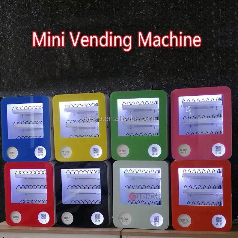 A mini-mart vending machine with QR code credit card Paypal Google pay online digital wallet payment