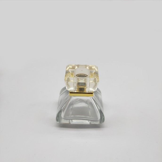 30ML special-shaped triangular pyramid spray high quality crimp neck perfume glass bottle with square lid with gold ring