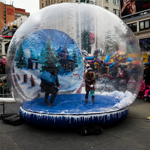 giant christmas inflatable snow globe photo booth