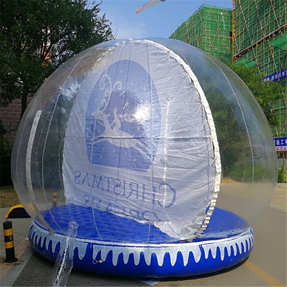 giant christmas inflatable snow globe photo booth