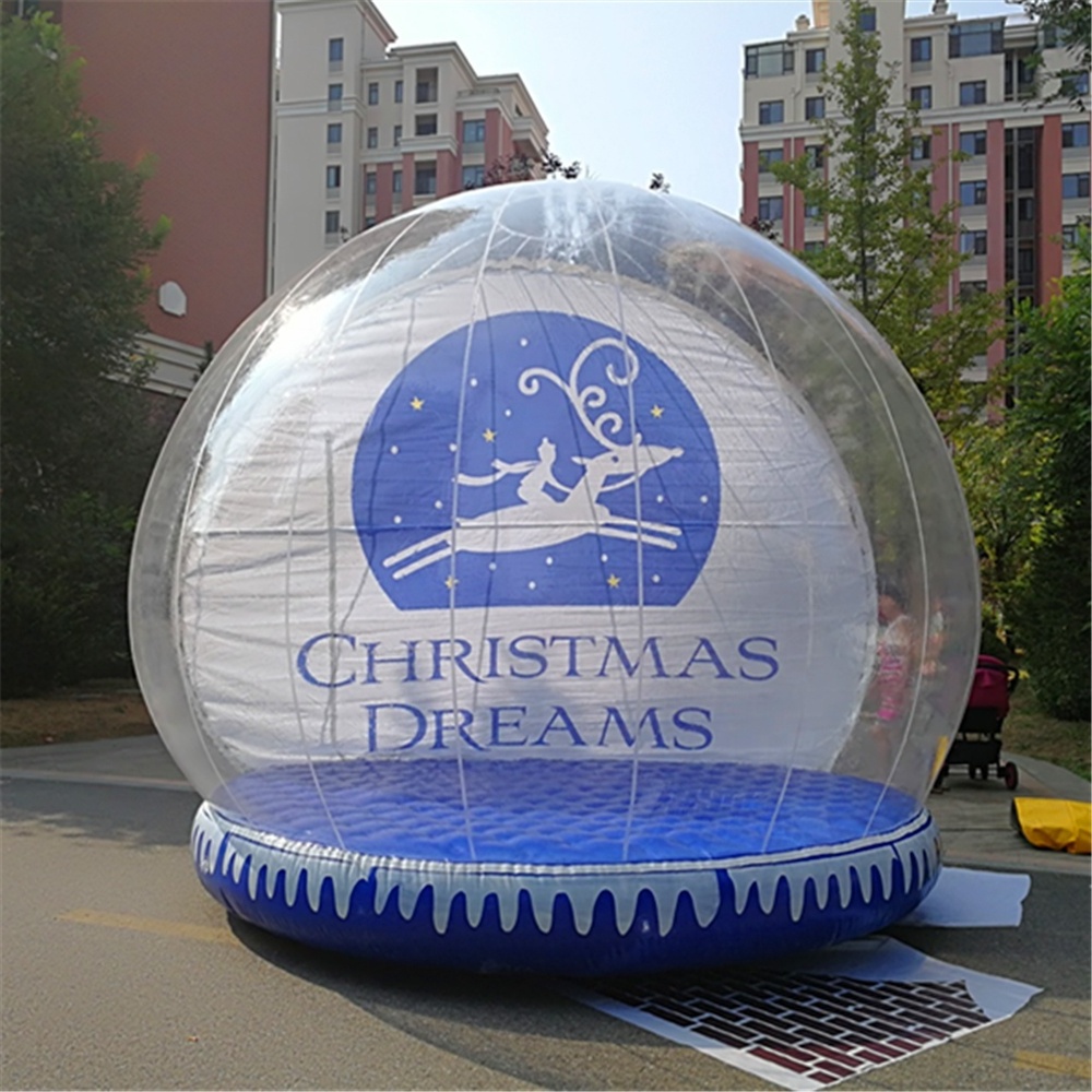 giant christmas inflatable snow globe photo booth