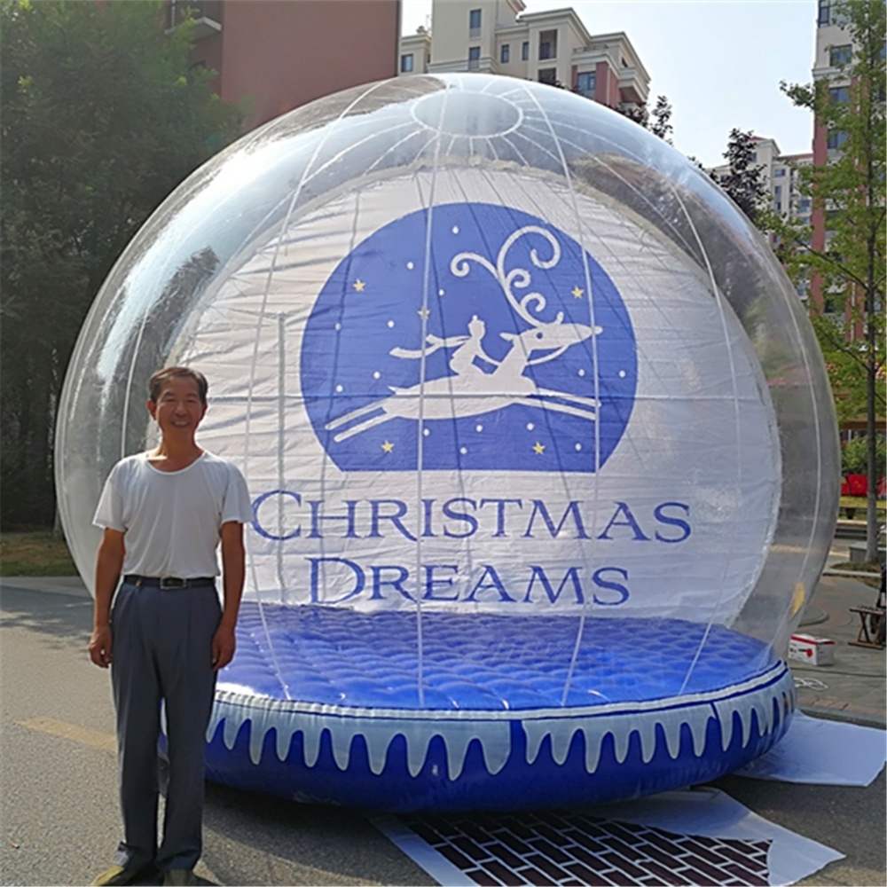 giant christmas inflatable snow globe photo booth