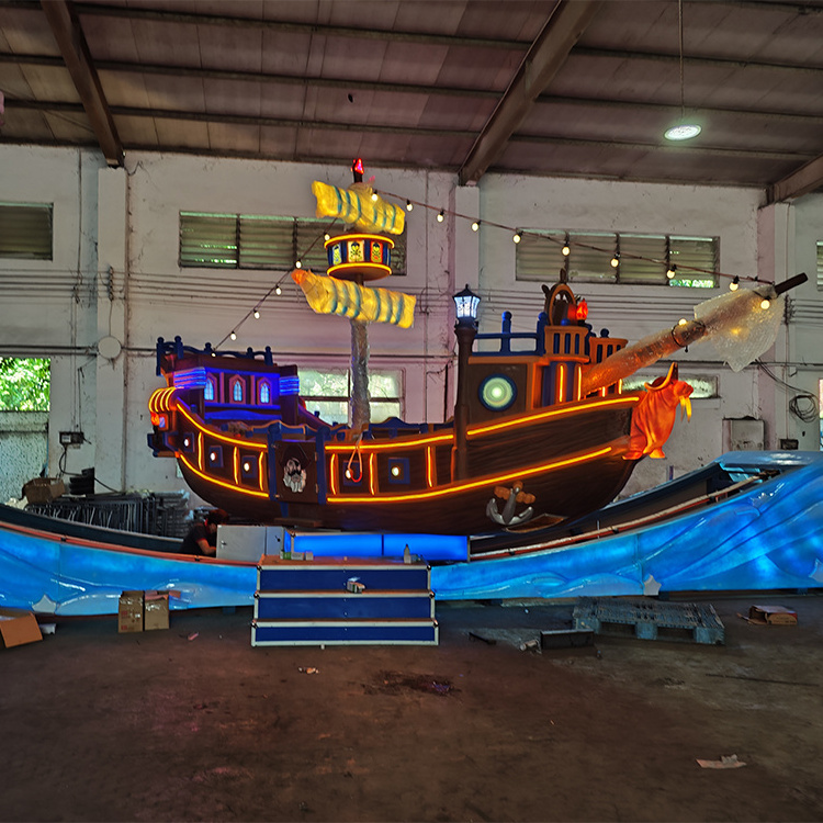 Brightly coloured and brightly lit amusement park rides new pirate ship flying car for adults for sale