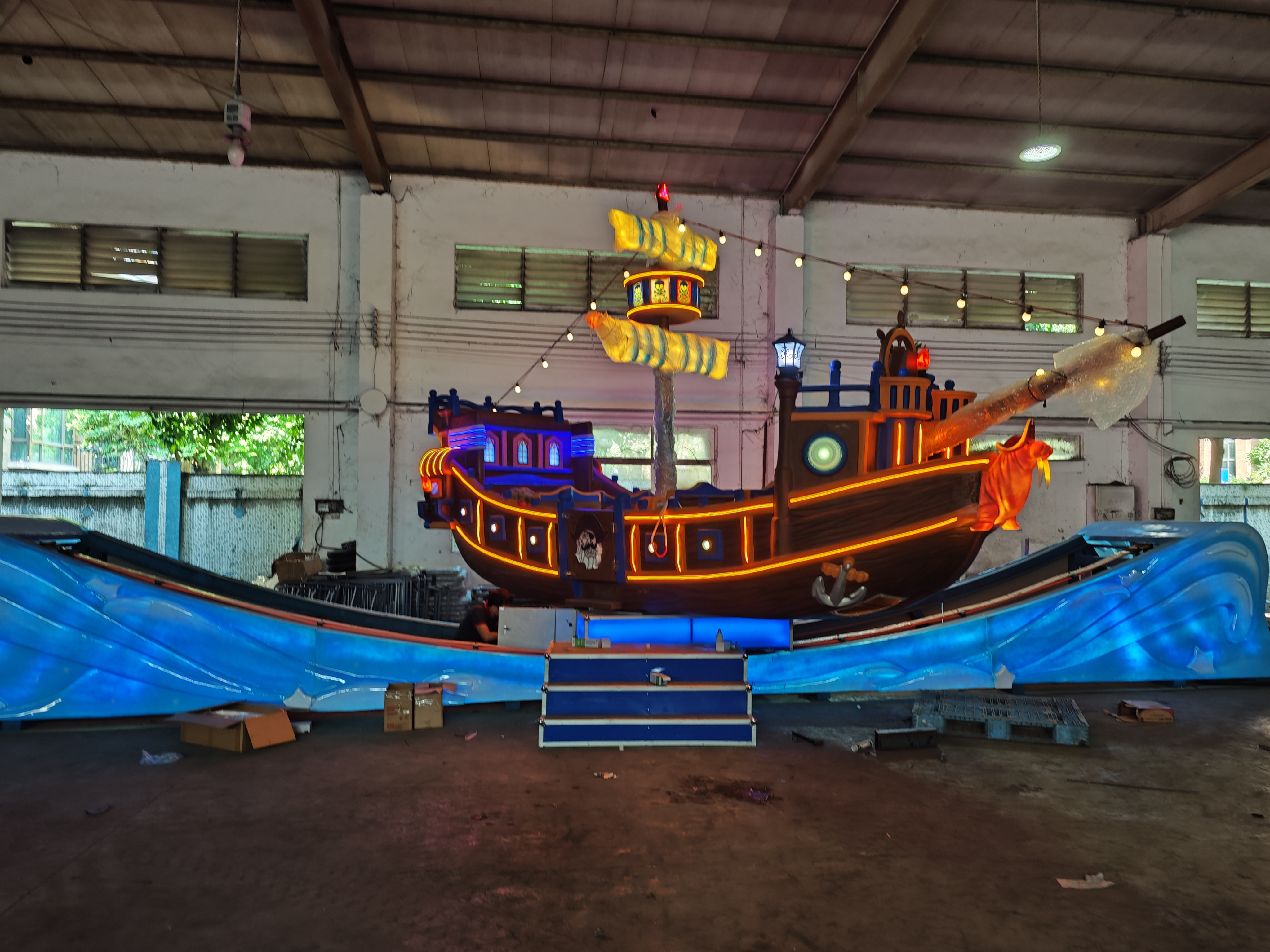 Brightly coloured and brightly lit amusement park rides new pirate ship flying car for adults for sale