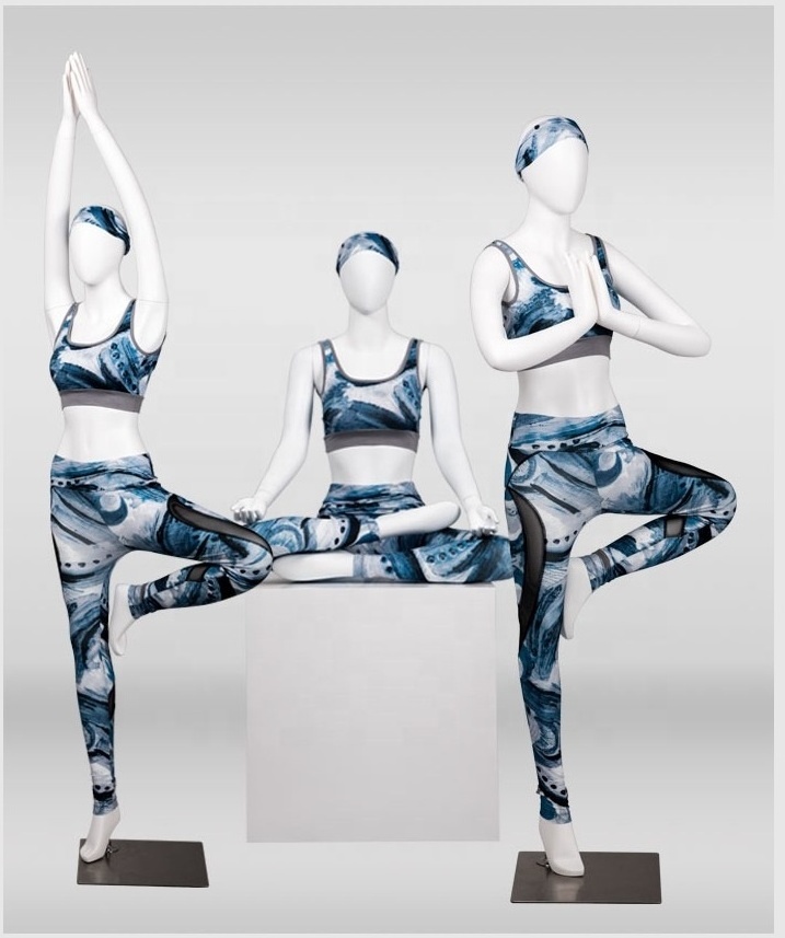 .window display female yoga mannequin