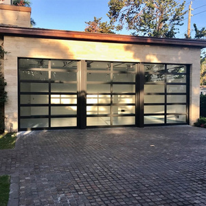 Top Level Modern Glass Vertical Bifold Garage Doors