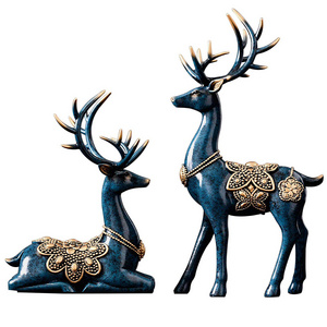 Custom wholesale Christmas deer statue decoration animal reindeer figurine holiday ornaments supplies for home decor