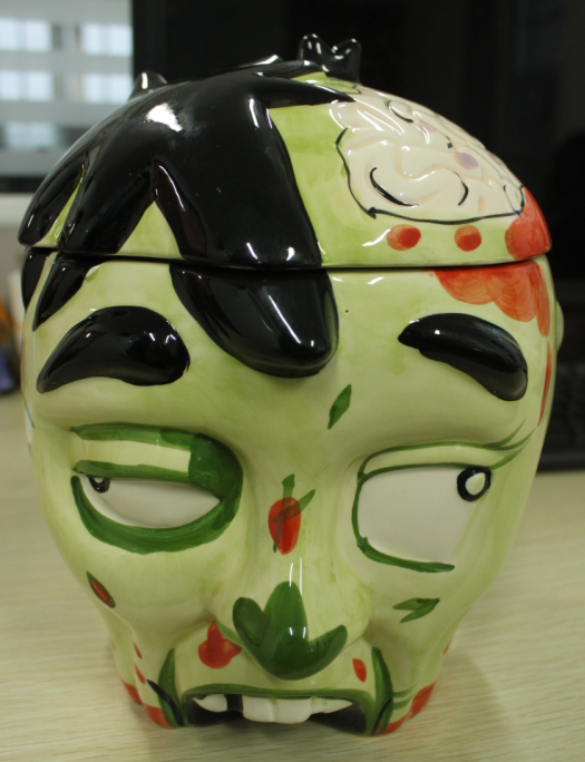 OEM handmade skull canister hot sales porcelain candy jar food safe ceramic zombie cookie jars for Halloween