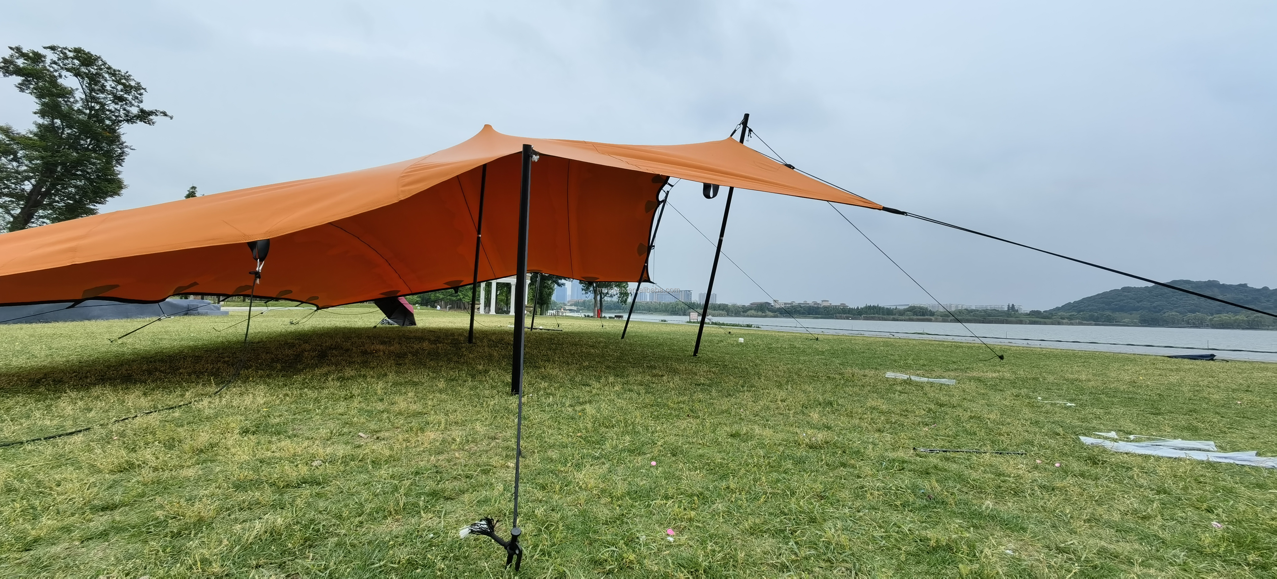 Unistrengh Camping aluminum pole spider star shaped stretch tent for events advertising stretch tents