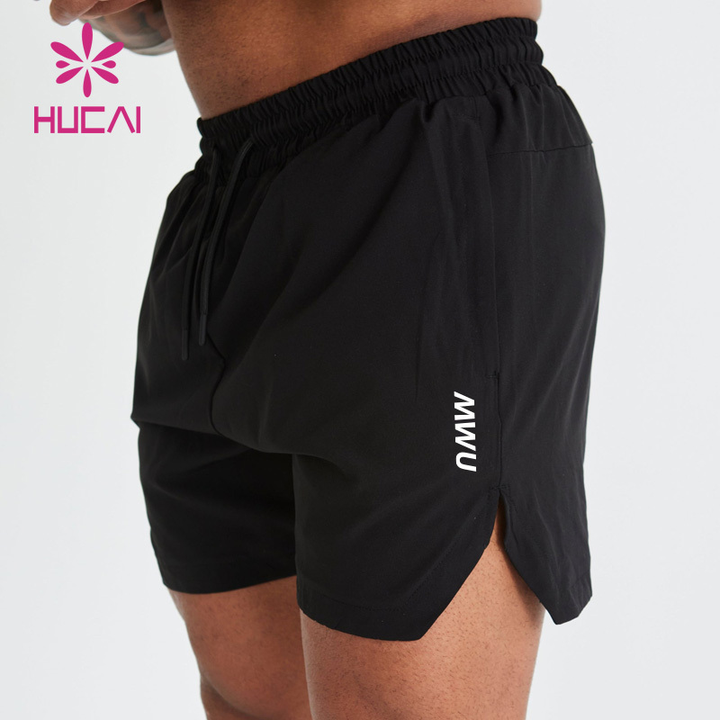 HUCAI custom logo polyester spandex  Athletic nylon short split Hem cut workout mens gym sports shorts