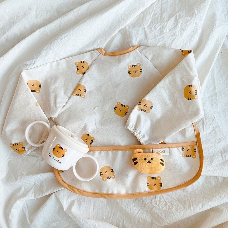 New Trend Leather Pu Waterproof baby eating bib soft PU baby pocket customized long sleeve bib for feeding