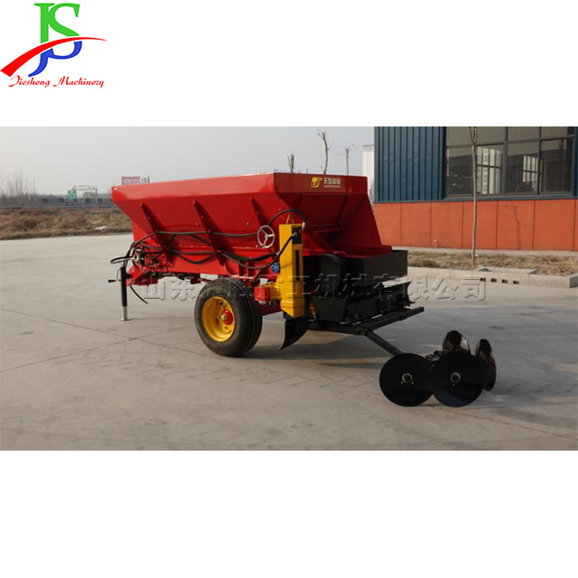 Towed tractor supporting 2 cubic fully mechanical organic fertilizer spreading machine