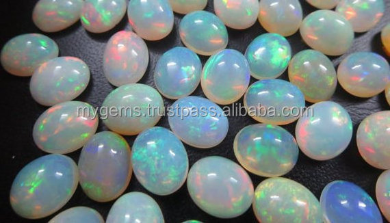 3 Carats Average Size High Grade Quality Natural Ethiopian Welo white base color fire opal Cabochon Loose gemstone