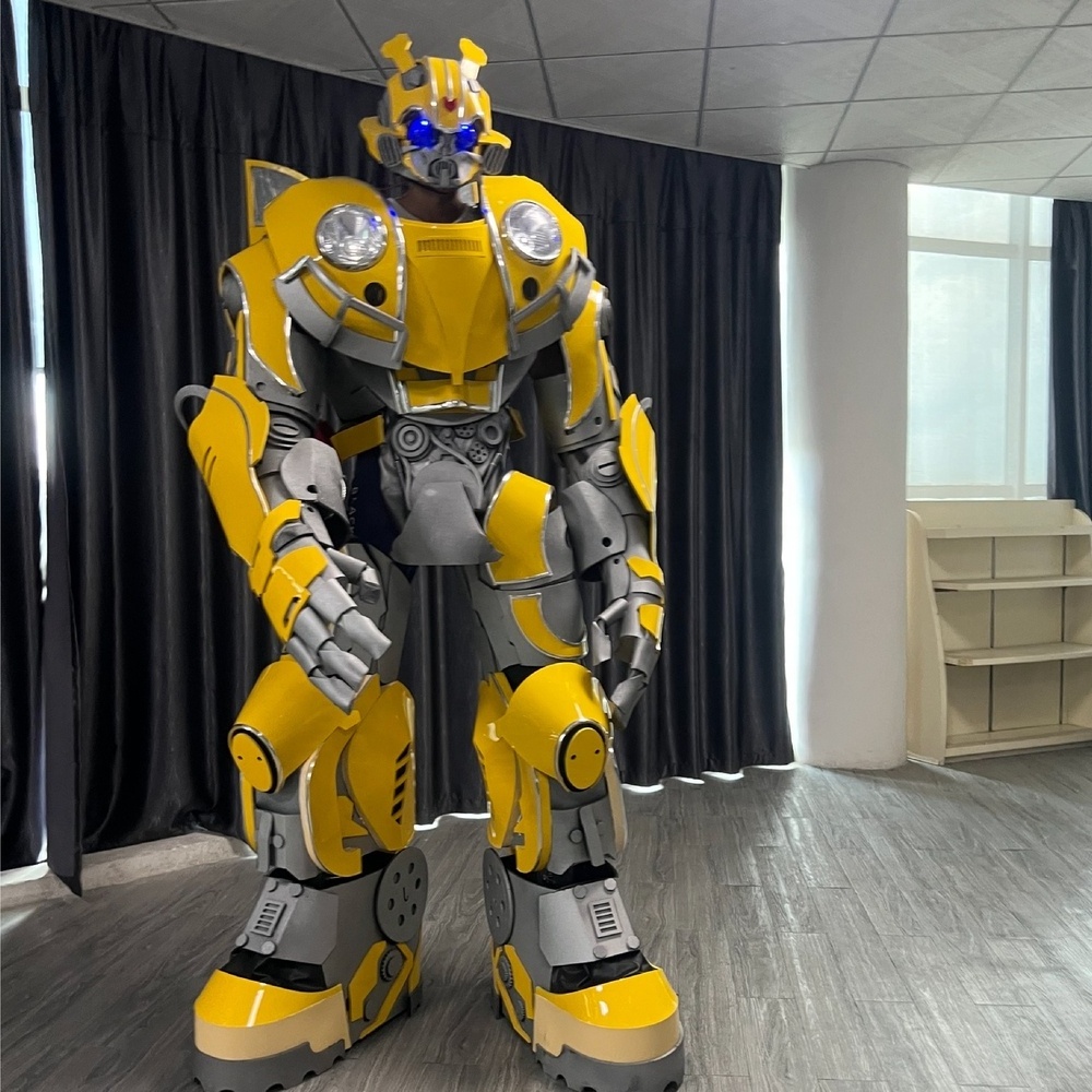 Guangzhou Namchi Amazing High Quality Realistic Human Inside Stilt Legs Robot Cosplay Led Costumes Yellow Robot Suit